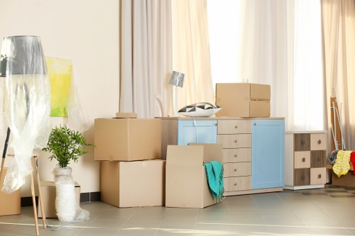 Student removals in Belgravia with a packed moving van outside elegant London homes