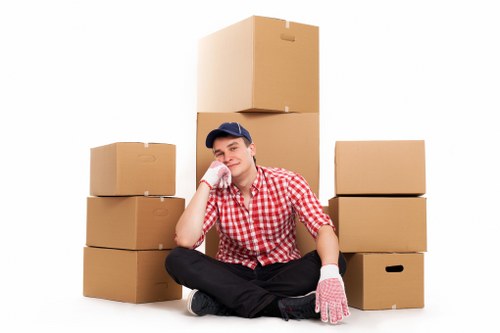 Professional movers handling furniture in Belgravia